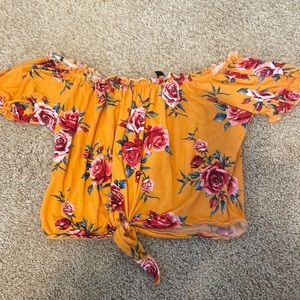Small H&M yellow floral off the shoulder top.